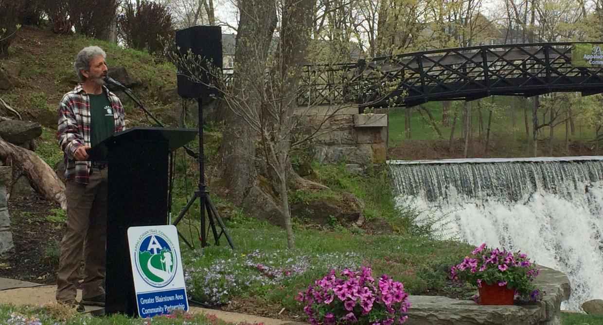 Steve Weissman speaks at the Blairstown Appalachian Trail Community inaugural event beside Blair Falls. Photo by Peter Dolan.