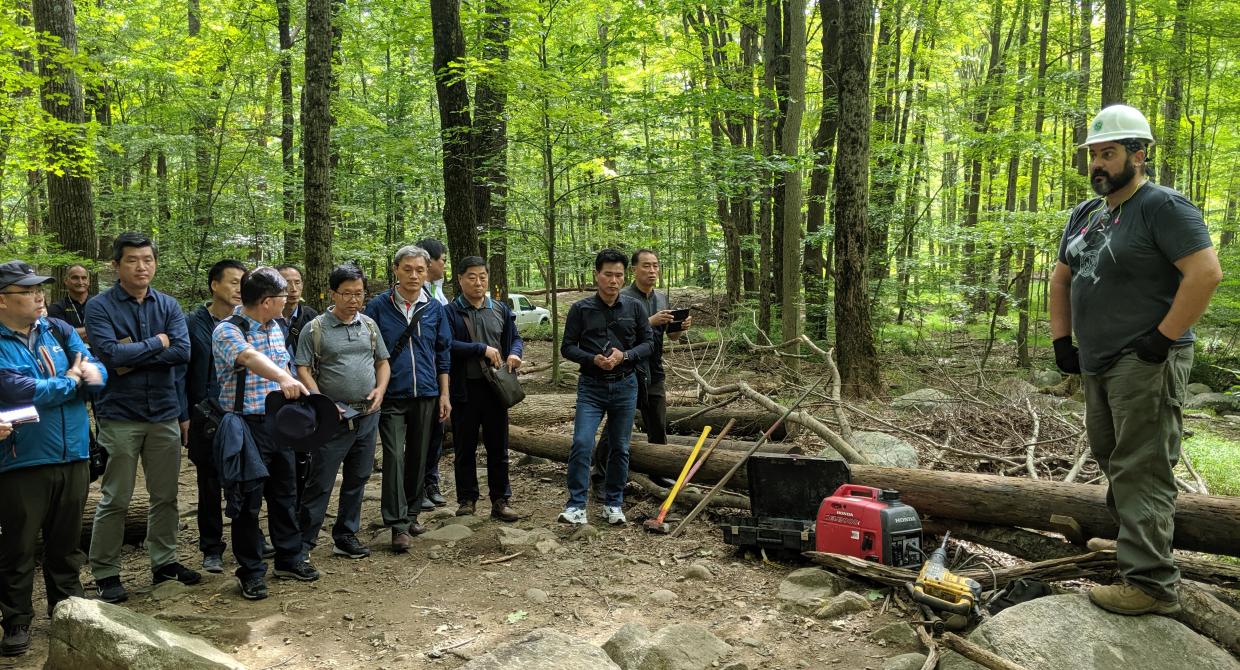 Ben speaking to the Korean Forest Service. Photo by Tori Finn.