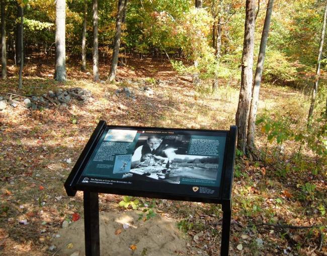 Trail interpretative sign on the Hasenclever Iron Trail. Photo by Paul Frost.