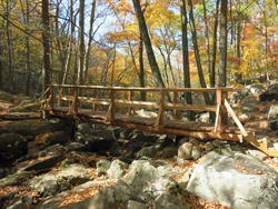 Footbridge over Pine Meadow Lake just above Cascade of Slid. Photo by Daniel Chazinl