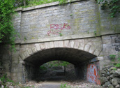 The stone-arch bridge built in 1840 over a quarry raiilway. Photo by Daniel Chazin.